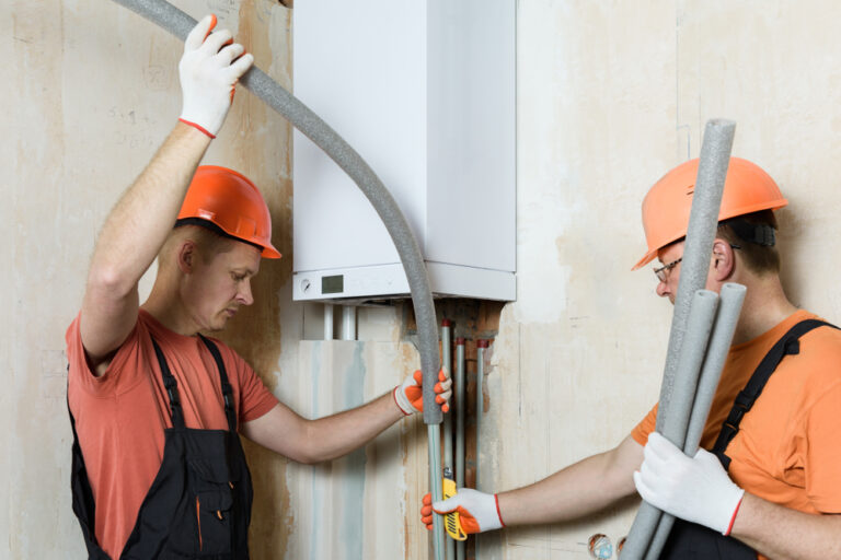 Workers,Are,Installing,Thermal,Insulation,On,The,Pipes,Of,A