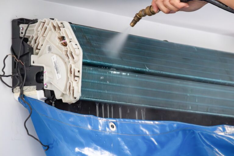 Air,Conditioning,Cleaning,Service,With,Water,Spray